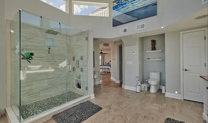 Full bath with a glass shower