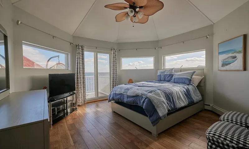 Primary bedroom looking out at Barnegat Bay